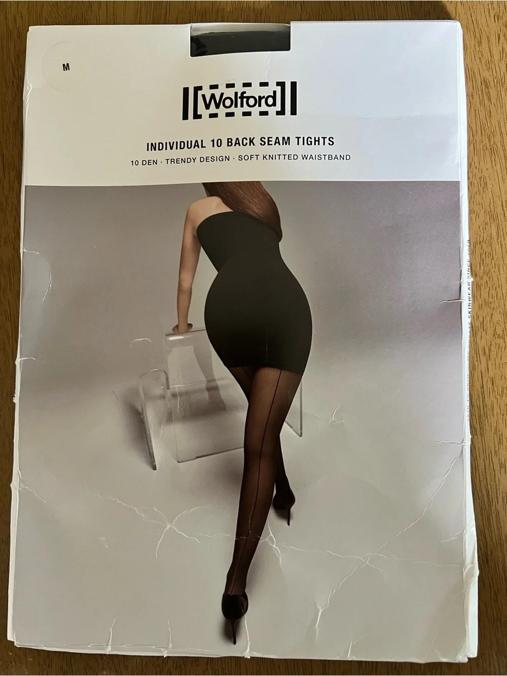 Wolford individual 10 back seam tights size M. Never worn in package. Black